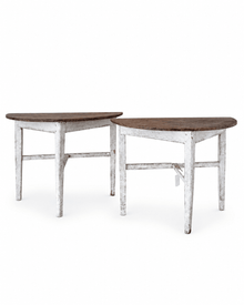 Pair of antique Swedish demilune tables with tapered white-painted legs and dark stained half-round tops