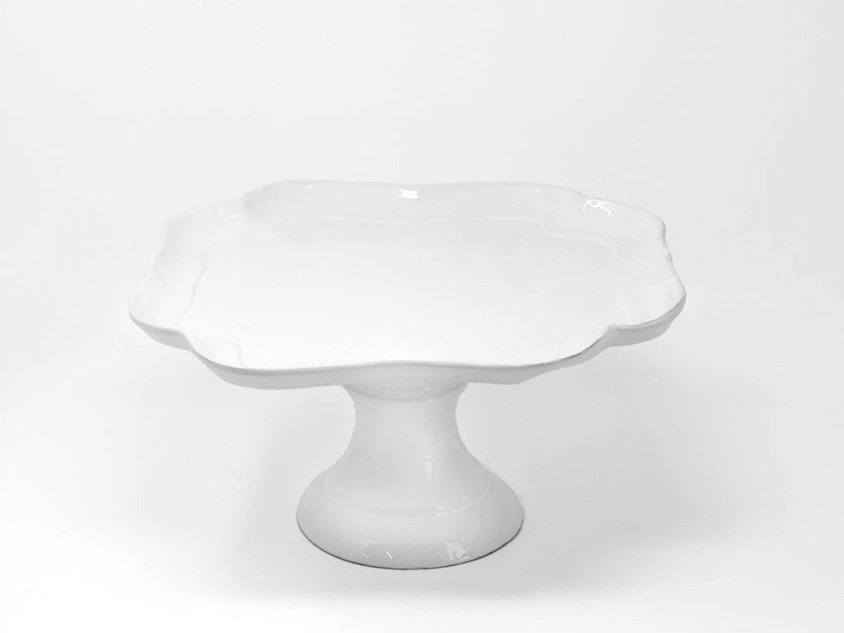White ceramic Coupe Mademoiselle footed compote with a scalloped rim, 30cm, on a pedestal foot.