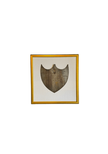 Framed Antique Metal Sign on White Linen Mat
