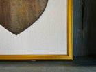 Framed Antique Metal Sign on White Linen Mat