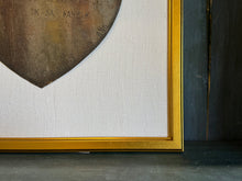 Framed Antique Metal Sign on White Linen Mat