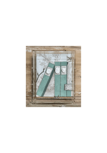 Shadowbox with three sage-green faux book spines and plaster intaglio medallions mounted on toile fabric in an acrylic frame