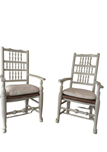 Pair of mid-19th century English spindle-back armchairs with rush seats and block print cushions, in a whitewashed painted finish