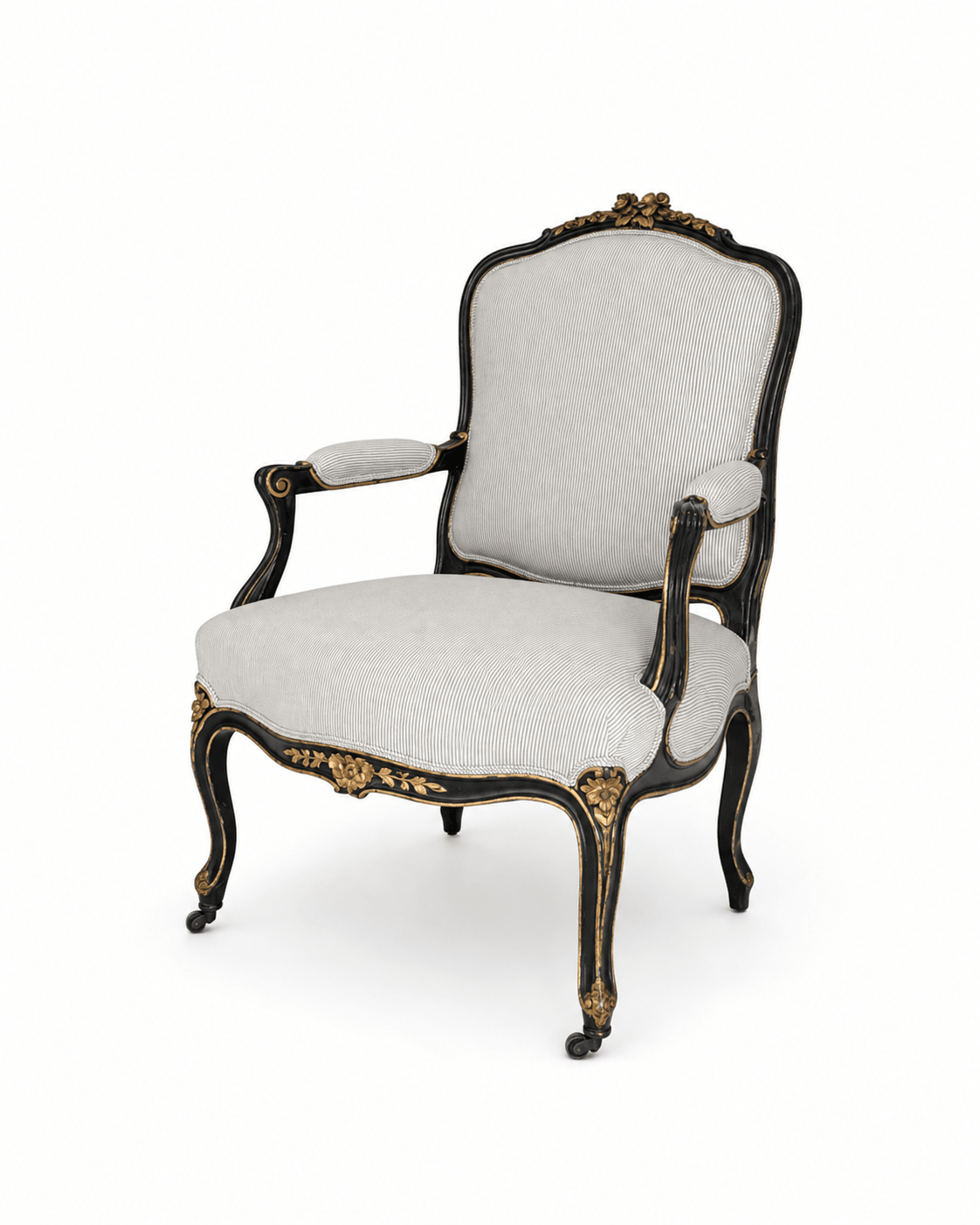 Louis XV-style armchair, black-painted with gilt floral carving and cabriole legs, upholstered in white and black pinstripe fabric