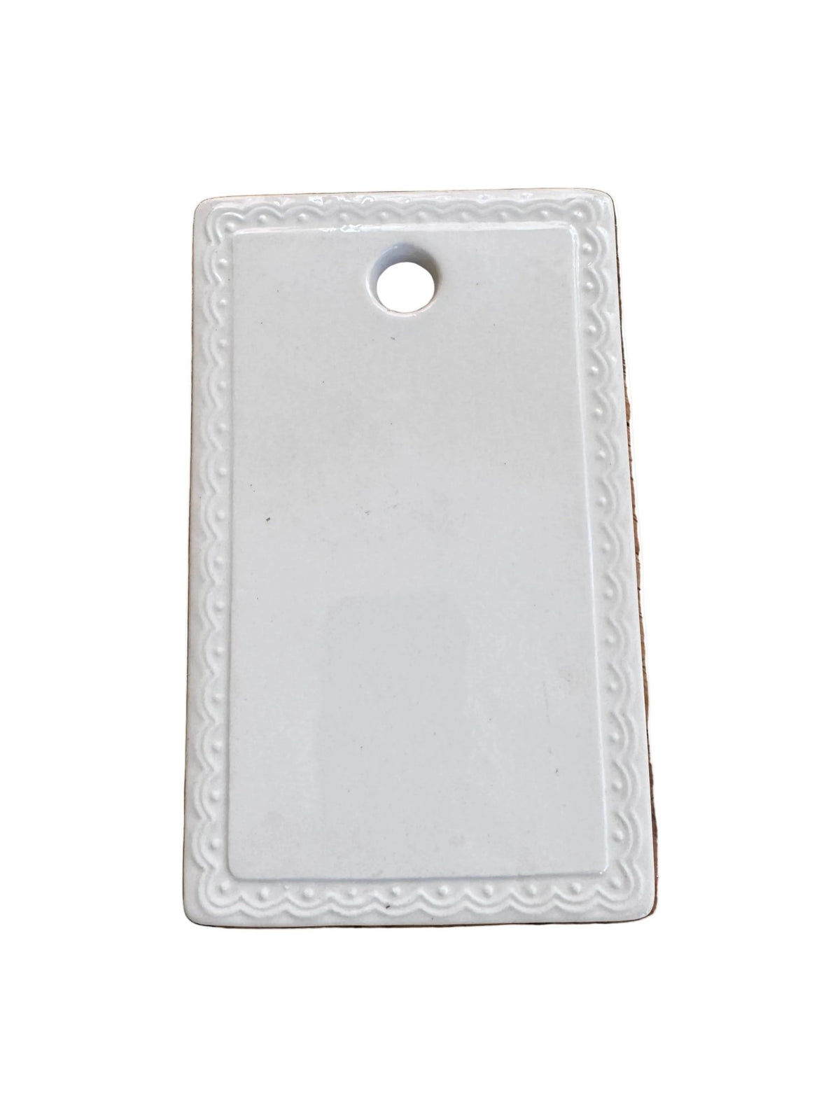 White ironstone bread and butter board with a rectangular shape, beaded scalloped rim, and a hanging hole at the top